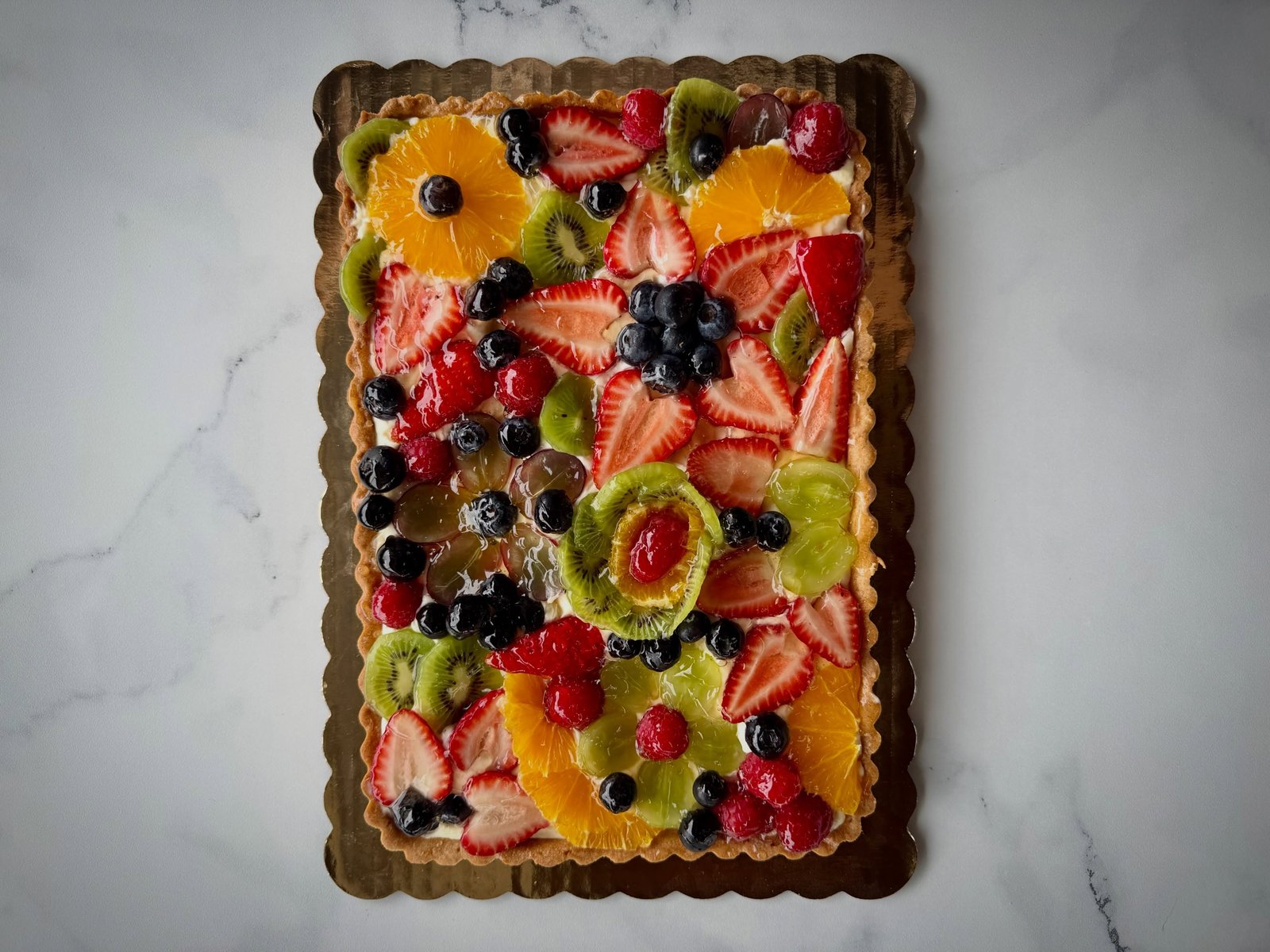 Fresh fruit tart with kiwi, strawberry and blueberry