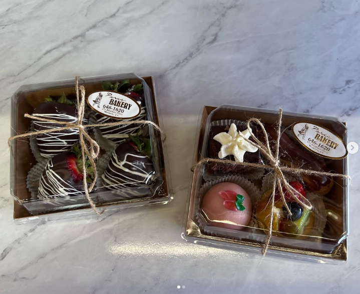 Chocolate-dipped strawberries and petit fours gift boxes